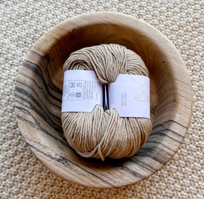 a ball of beige dk double knit organic cotton 50g ball