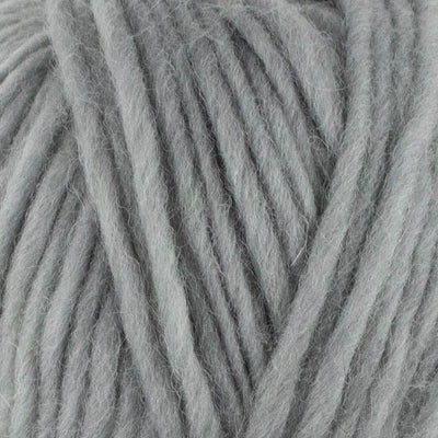 a close up of british bluefaced kerry hill fleece in light grey chunky weight yarn for knitting weaving or crochet