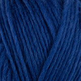 a close up of british bluefaced kerry hill fleece in dark blue chunky weight yarn for knitting weaving or crochet