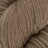 close up of taupe light brown aran weight skein machine washable for knitting crocheting and weaving 
