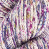 a close up of white purple yellow pink aran weight skein machine washable for knitting crocheting and weaving