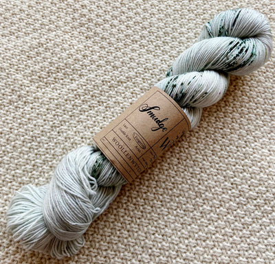 mint green fingering weight yarn in a 100g skein