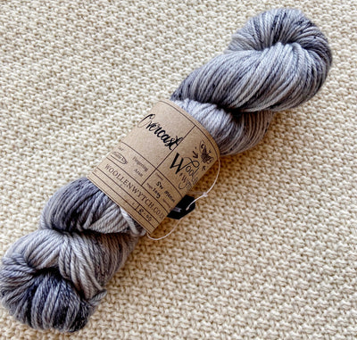 dark and light grey dk double knit weight yarn in a 100g skein