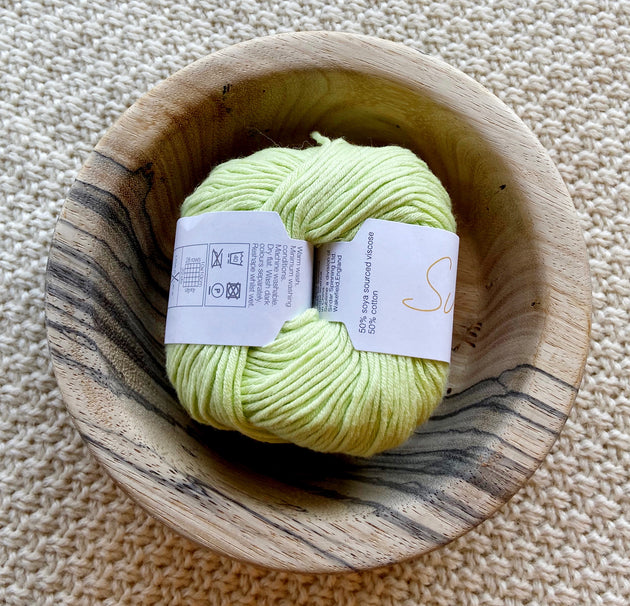 a ball of lime green dk double knit organic cotton 50g ball