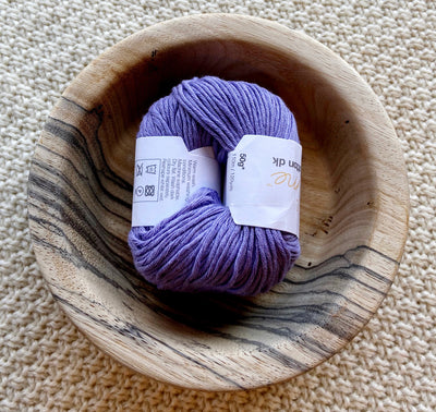a ball of purple dk double knit organic cotton 50g ball