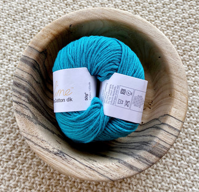 a ball of bright blue dk double knit organic cotton 50g ball