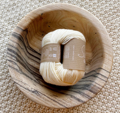 a ball of white cream dk double knit organic cotton 50g ball