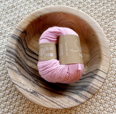 a ball of pink dk double knit organic cotton 50g ball