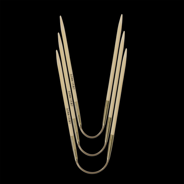 three cracytrio bamboo needles 