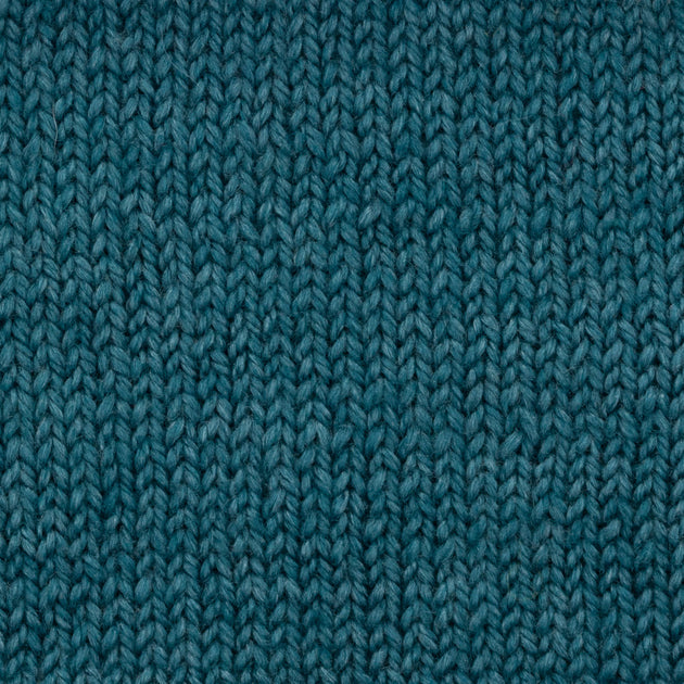 knitted swatch of blue teal 4ply yarn wool and silk