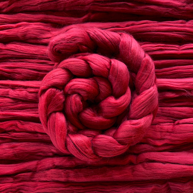 red eco nylon biodegradable spinning fibre braid wrapped in a spiral 