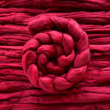 red eco nylon biodegradable spinning fibre braid wrapped in a spiral 