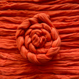 orange eco nylon biodegradable spinning fibre braid in a spiral 