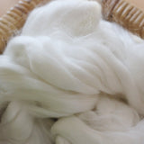 a close up of a basket full of bamboo vegan spinning fibre 