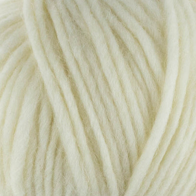 a close up of british bluefaced kerry hill fleece in white chunky weight yarn for knitting weaving or crochet
