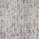 close up of a knitted swatch of white blue pink aran weight skein machine washable for knitting crocheting and weaving