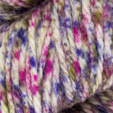 close up of mustard yellow pink purple white aran weight skein machine washable for knitting crocheting and weaving