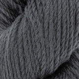 close up of grey aran weight skein machine washable for knitting crocheting and weaving