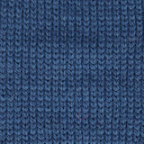close up of knitted dark blue navy  aran weight skein machine washable for knitting crocheting and weaving