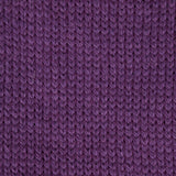 close up of a knitted swatch of dark purple aran weight skein machine washable for knitting crocheting and weaving