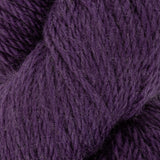 a close up of dark purple aran weight skein machine washable for knitting crocheting and weaving