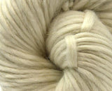close up photo of white cream chunky weight merino 200g ball for knitting crocheting and weaving