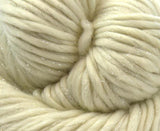 close up photo of cream chunky weight merino 200g ball for knitting crocheting and weaving